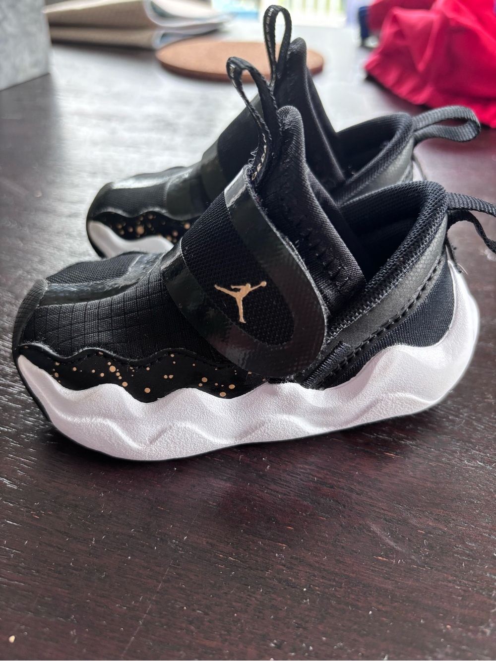 Jordan Kids Black and White Slip-On Sneakers with Gold Accents